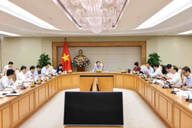 Phó Thủ tướng Trần Hồng Hà chủ trì cuộc họp. (Ảnh: Minh Đức/TTXVN)