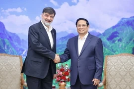 Thủ tướng Phạm Minh Chính tiếp Tư lệnh Thực thi pháp luật Iran Ahmad Reza Radan. (Ảnh: Dương Giang/TTXVN)
