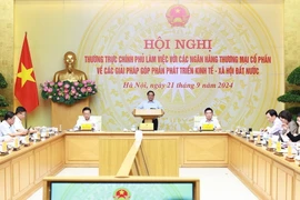 Thủ tướng Phạm Minh Chính chủ trì Hội nghị Thường trực Chính phủ làm việc với các ngân hàng thương mại cổ phần về các giải pháp góp phần phát triển kinh tế-xã hội. (Ảnh: Dương Giang/TTXVN)