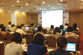 Công bố Báo cáo Kinh tế vĩ mô thường kỳ quý 3, ngày 11/10. (Ảnh: PV/Vietnam+)