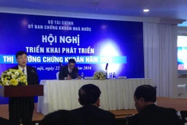 Hội nghị “Triển khai nhiệm vụ phát triển thị trường chứng khoán năm 2016,” ngày 22/1. (Ảnh: PV/Vietnam+)