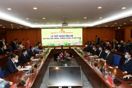 Bộ Tài chính tổ chức lễ tiếp nhận ủng hộ Quỹ vaccine phòng, chống COVID-19 từ một số tổ chức, doanh nghiệp trong và ngoài nước. (Ảnh: Phạm Hậu/TTXVN)