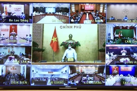 Thủ tướng Phạm Minh Chính chỉ đạo họp trực tuyến toàn quốc trước diễn biến mới của dịch COVID-19. (Ảnh: Lâm Khánh/TTXVN)