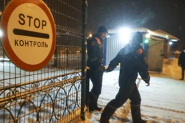 Các nhân viên cứu hộ làm việc tại khu vực xảy ra tai nạn ở mỏ than Listvyazhnaya, tây nam Siberia. (Nguồn: TASS)