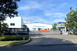 Các doanh nghiệp trong Khu chế xuất Tân Thuận thực hiện "3 tại chỗ." (Ảnh: Thanh Vũ/TTXVN)