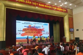 Chương trình "Tháng hành động vì bình đẳng giới và phòng ngừa ứng phó với bạo lực trên cơ sở giới" được tổ chức tại Quân Đoàn 4, Thành phố Hồ Chí Minh. (Ảnh: Thanh Vũ/TTXVN)