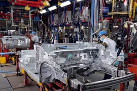 Sản xuất xe ôtô tại nhà máy Ford Hải Dương. Ảnh: Trần Việt - TTXVN