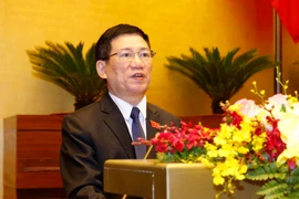 Tổng Kiểm toán Nhà nước Hồ Đức Phớc trình bày Báo cáo công tác nhiệm kỳ 2016-2021 của Kiểm toán Nhà nước. (Ảnh: Doãn Tấn/TTXVN)