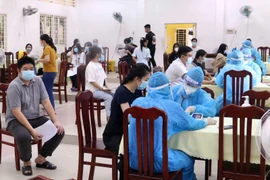 Tiêm vaccine ngừa COVID-19 tại Ludwigsburg, Đức. (Ảnh: AFP/TTXVN)