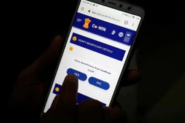 Ứng dụng CoWIN trên điện thoại tại Ấn Độ. (Ảnh: Reuters)