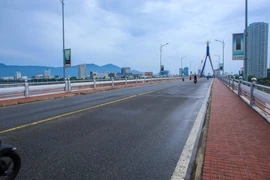 Người dân Đà Nẵng sẽ phải hạn chế ra đường khi không có có việc cần thiết để tích cực phòng, chống dịch. (Ảnh: Trần Lê Lâm/TTXVN)