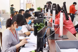 Giải quyết hồ sơ thủ tục hành chính cho người dân, doanh nghiệp tại Sở Tư pháp TP Hồ Chí Minh. (Nguồn: hcmcpv.org.vn)