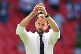 Huấn luyện viên Gareth Southgate vui mừng sau khi các học trò giành chiến thắng trong trận đấu với Croatia trên sân vận động Wembley ở London, Anh, ngày 13/6/2021. (Ảnh: AFP/TTXVN)