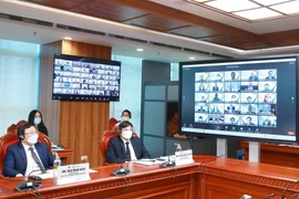 Đại biểu Kiểm toán Nhà nước Việt Nam dự Đại hội Tổ chức các Cơ quan kiểm toán tối cao châu Á (ASOSAI) lần thứ 15 tại điểm cầu Hà Nội. (Ảnh: Phương Hoa/TTXVN)