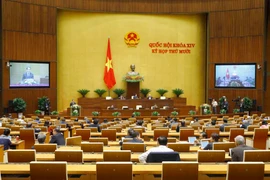 Luật Cư trú (sửa đổi) được thông qua tại Kỳ họp thứ 10, Quốc hội khóa XIV. (Ảnh: Doãn Tấn/TTXVN)