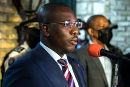 Thủ tướng lâm thời Haiti Claude Joseph trong cuộc họp báo ở Port-au Prince ngày 11/7/2021. (Ảnh: AFP/TTXVN)