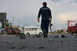 Hiện trường một vụ tấn công tại Baghdad, Iraq. (Ảnh: Anadolu Agency/TTXVN)