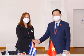 Chủ tịch Quốc hội Vương Đình Huệ và Phó Chủ tịch Quốc hội Cuba, bà Ana Maria Mari Machado. (Ảnh: Doãn Tấn/TTXVN)