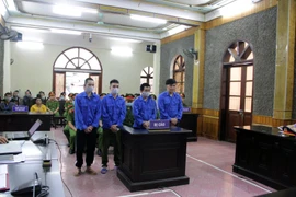 Các bị cáo tại phiên tòa. (Ảnh: Hữu Quyết/TTXVN)