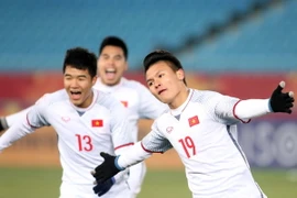 Niềm vui của các cầu thủ U23 Việt Nam sau khi san bằng tỉ số 2-2. (Ảnh: Hoàng Linh/TTXVN)