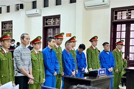 Các bị cáo tại phiên xét xử. (Ảnh: Nguyên Linh/TTXVN)