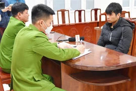 Đối tượng Vũ Đăng Mạnh tại cơ quan điều tra. (Ảnh: Thái Hùng/TTXVN)