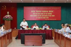 Ông Nguyễn Xuân Thắng, Chủ tịch Hội đồng Lý luận Trung ương, Giám đốc Học viện Chính trị Quốc gia Hồ Chí Minh phát biểu tại hội thảo. (Ảnh: Phương Hoa/TTXVN)