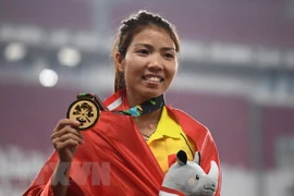 Vận động viên Bùi Thị Thu Thảo giành Huy chương Vàng nội dung nhảy xa nữ tại ASIAD 2018. (Nguồn: AFP/TTXVN)