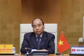 Thủ tướng Nguyễn Xuân Phúc tham dự Hội nghị thượng đỉnh trực tuyến G20 về ứng phó dịch COVID-19 ngày 26/3/2020. (Ảnh: Thống Nhất/TTXVN)