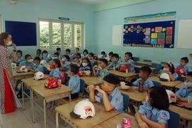 Buổi sinh hoạt lớp của học sinh lớp 1, Trường Tiểu học Đinh Tiên Hoàng (Quận 1). (Ảnh: Thu Hoài/TTXVN)