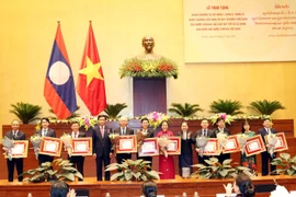 Quang cảnh Lễ trao Huân chương Hữu nghị cho các tập thể và cá nhân. (Ảnh: Trọng Đức/TTXVN)