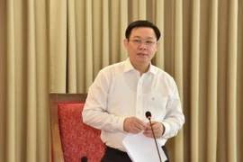 Bí thư Thành ủy Hà Nội Vương Đình Huệ chủ trì hội nghị. (Nguồn: TTXVN)