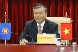 Thứ trưởng Bộ Nội vụ Nguyễn Trọng Thừa chủ trì tại điểm cầu Hà Nội (Việt Nam). (Ảnh: Văn Điệp/TTXVN)