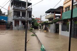 Mưa lớn gây ngập tại tổ 19, phường Tiền Phong, thành phố Thái Bình. (Ảnh: Thế Duyệt/TTXVN)