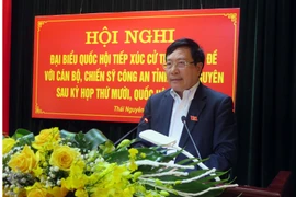 Phó Thủ tướng, Bộ trưởng Ngoại giao Phạm Bình Minh trả lời ý kiến cử tri. (Ảnh: Trần Trang/TTXVN)
