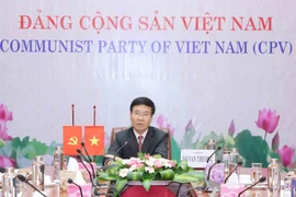 Trưởng Ban Tuyên giáo Trung ương Võ Văn Thưởng tại hội đàm trực tuyến. (Ảnh: Phương Hoa/TTXVN)