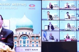 Thủ tướng Nguyễn Xuân Phúc và lãnh đạo các nền kinh tế thành viên thông qua Tầm nhìn APEC Putrajaya 2040. (Ảnh: Thống Nhất/TTXVN) 