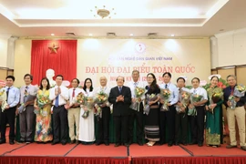  Ban Chấp hành Hội Văn nghệ dân gian Việt Nam nhiệm kỳ VIII (2020-2025) ra mắt Đại hội (Ảnh: Thành Đạt/TTXVN)