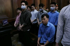 Bị cáo Trần Ngọc Phúc (ngồi) tại phiên tòa. (Ảnh: Thành Chung/TTXVN)