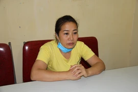 Đối tượng Nguyễn Thị Thanh Nhàn tại cơ quan điều tra. (Nguồn: TTXVN)
