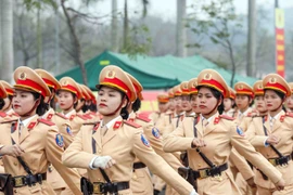Khối Cảnh sát Giao thông sẽ do các cán bộ, chiến sỹ nữ đảm nhiệm. (Ảnh: Phạm Kiên/TTXVN)