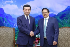 Thủ tướng Phạm Minh Chính tiếp Bộ trưởng Bộ Ngoại giao Uzbekistan Bakhtiyor Saidov. (Ảnh: Dương Giang/TTXVN)