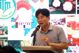 Ông Phương Đình Anh, Phó Chánh Văn phòng Điều phối Nông thôn mới Trung ương thông tin tổng quan về Chương trình OCOP Việt Nam. (Ảnh: Kim Há/TTXVN)