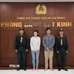 Hai 2 bị can là vợ chồng Trần Thị Như Hảo và Nguyễn Trọng Anh bị bắt tạm giam. (Ảnh: TTXVN phát)