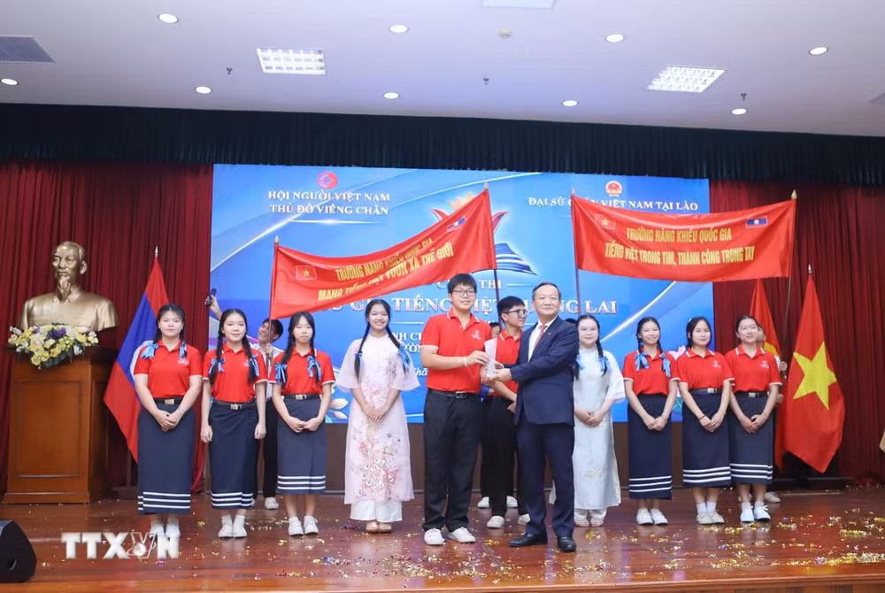 ttxvn-tieng-viet-cau-noi-gin-giu-quan-he-dac-biet-viet-nam-lao-mai-vung-ben4.jpg