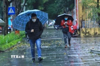 Nhiệt độ ở Bắc Bộ dao động khoảng 11-14 độ C, vùng núi 7-10 độ C. (Ảnh: Tuấn Anh/TTXVN)