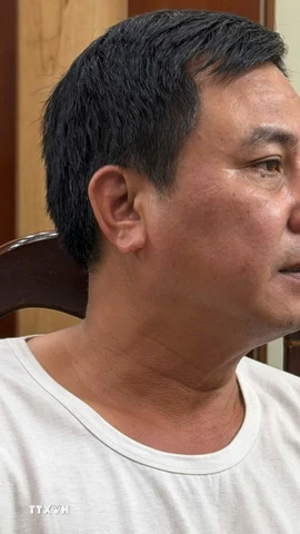 Lái xe Nguyễn Quang Thinh tại cơ quan điều tra. (Ảnh: TTXVN phát)