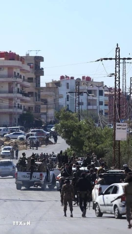 Lực lượng an ninh Syria tiến vào thành phố Sweida ở miền nam nước này. (Ảnh: THX/TTXVN)