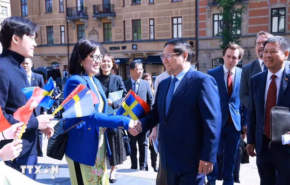 Thủ tướng Phạm Minh Chính thăm Đại học Kinh tế Stockholm. (Ảnh: Dương Giang/TTXVN)