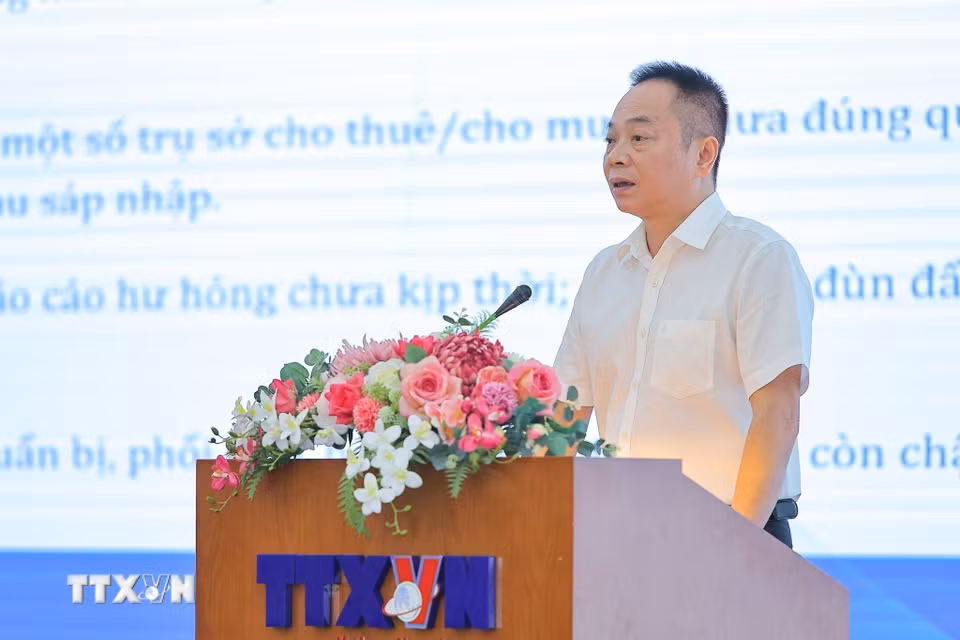 Đồng chí Ngô Thanh Sơn, Chánh Văn phòng TTXVN trình bày tham luận. (Ảnh: Lê Đông/TTXVN)